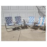 4 vintage folding woven webbing chairs