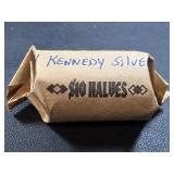 Roll of 20 1964 Kennedy silver half dollar coins.