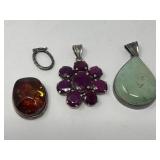 Group of amber, turquoise and quartz pendants