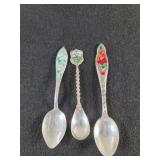 Three sterling silver and enamel souvenir spoons