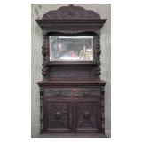 Antique hand carved oak sideboard with beveled