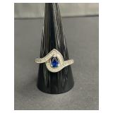 Sterling silver ring with blue CZ and baguette