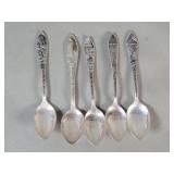 Five sterling silver souvenir spoons