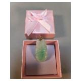 Jade pendant with 14k gold bail