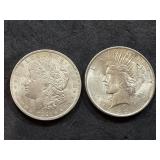 1921 Morgan silver dollar and 1922 Peace silver
