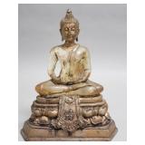 Vintage resin Buddha figurine on a composite