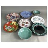 Group of vintage porcelain bowls and plates