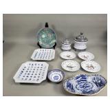 Box of pottery plates, bowls, canisters