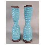 Pair of fluted ceramic vases featuring a bright