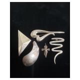 Group of vintage sterling silver brooches and
