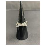 Sterling silver crossover ring with baguette CZ