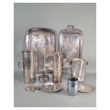 Group of silver plate serving trays, pitcher,
