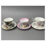 Three Floral Bone China Teacups and Saucers