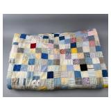 Patchwork Quilt with Floral Backing