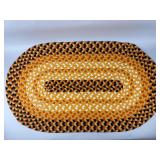 Oval Braided Wool Rug in Warm Tones