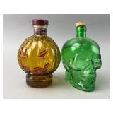 Pumpkin and Green Skull Glass Bottles