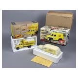 Two First Gear Kent Feeds Die-Cast Model Trucks
