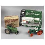 A Trio of Ertl and Enesco Die-Cast Toy Tractors