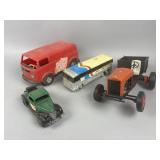 A Collection of Four Plastic Toy Vehicles