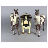 A Trio of Painted Plastic Farm Animal Figurines
