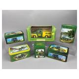 A Collection of Seven John Deere Tins & Ertl Truck