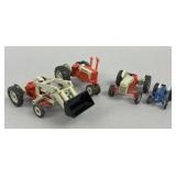 Four ERTL Miniature Ford Die-Cast Tractors