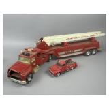 A Pair of Nylint and Smart Toys Fire Trucks