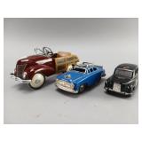 Three Die-Cast Toy Vehicles