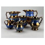 6 English Blue Banded Copper Lusterware Pitchers