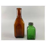 Amber Bottle and Green Labeled Glass Ant Killer Bo