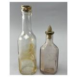Two Glass Bottles, One with Colgate & Co. Cap