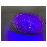Speckled Stone with UV-Reactive Properties