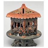 Vintage Cast Iron Carousel Coin Bank, 5in.
