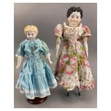 Pair of Porcelain Shoulder-Head Dolls