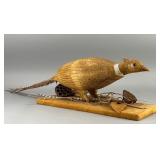 Carved Wooden Bird Figure on Fabric Base