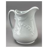 H. Burgess Embossed Ceramic Pitcher