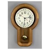 1970s Howard Miller #613 Oak Keyhole Wall Clock