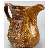 Brown Ceramic Relief-Decorated Pitcher
