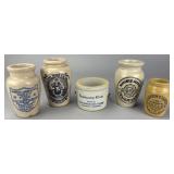 Group of Six Stoneware Advertising Cream Jars
