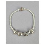 Sterling Silver Pandora Bracelet and 4 Beads