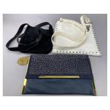 Three Fashion Handbags and Clutch