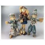 Three Straw Scarecrow Figures