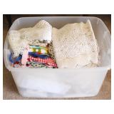 Plastic Tote with Assorted Linens