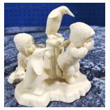 Snow Babies playing peek a boo with penguins