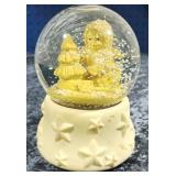 Snow Baby snow globe, plays "Oh Christmas Tree"