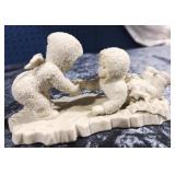 2 Snow Babies with Stars Lying Down