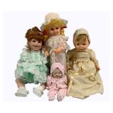 4 Assorted Dolls