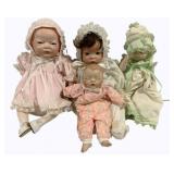 4 Assorted Baby Dolls