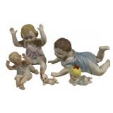Group Porcelain Piano Babies