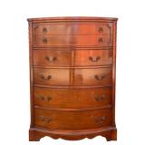 Vintage Mahogany Bellflower Carved Bowed Chest